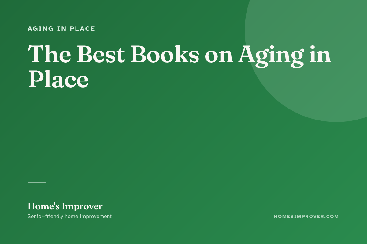 Five books on aging in place stacked next to a notebook on a kitchen table